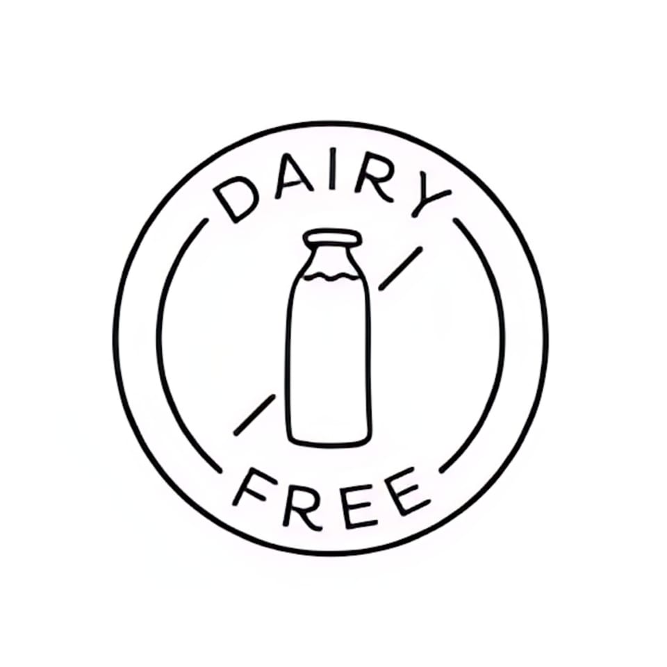 Black and white dairy-free icon with a milk bottle crossed out inside a circle.