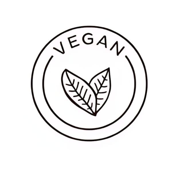 Black and white circular vegan logo with two leaves and the word "VEGAN" above them.